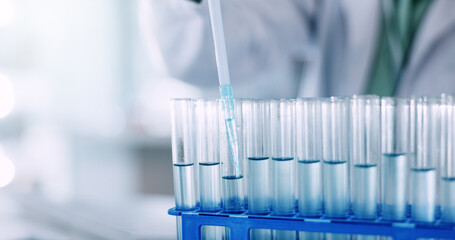 Science, liquid and test tubes with chemical in laboratory for experiment, research or project....