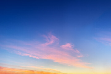 Sunset sky background. Sky with orange golden sunset clouds.  Nature sky background for design.