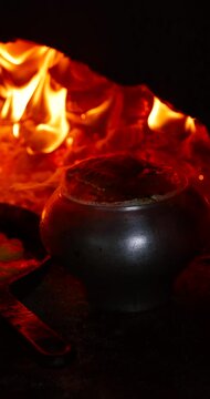 Traditional Belarusian and Slavic dishes cooking in a rustic oven. Hearty meals like draniki (potato pancakes) and porridge slowly baking in real fire. Authentic countryside kitchen