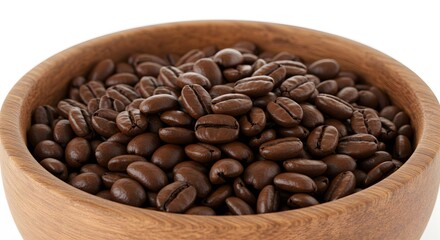 Fototapeta premium A wooden bowl filled with rich, aromatic roasted coffee beans, isolated on white.