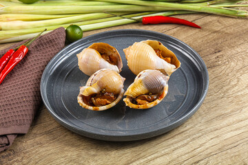 Snails baked with garlic and spices