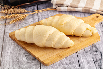 Raw uncooked croissant for bake