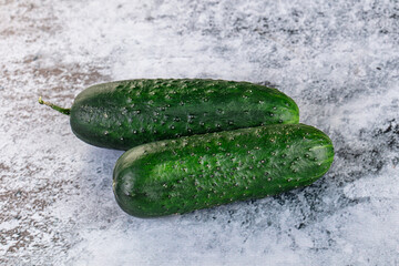 Ripe green raw two cucumbers