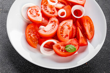 Tomato salad appetizer vegetables dish organic product fresh tasty gourmet food background on the table rustic food top view copy space keto and paleo diet vegetarian and vegan food