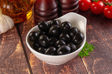 Mediterranean marinated Black olives in the bowl