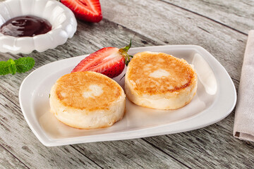 Cottage cheese pancakes - Syrniki for breakfast