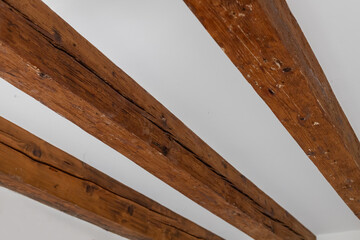 Exposed wooden ceiling beams in interior
