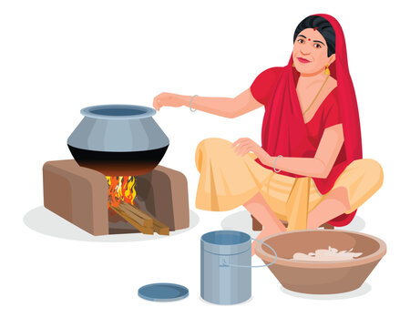 Indian village woman cooking food In an Ancient Or Old Kitchen