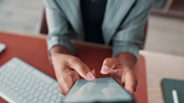 Person, hands and typing with phone screen above for communication, message or chat at office desk. Top view, employee or user with mobile smartphone display for texting, online app or social media