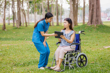 Fototapeta premium Amid the calming greenery of the hospital’s garden, a caring female physician provides thoughtful consultation and guidance on treatment for her patient.