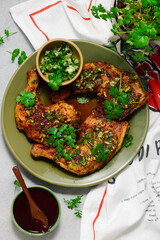 Grilled chicken legs with cilantro, garlic and hot sauce.top veiw