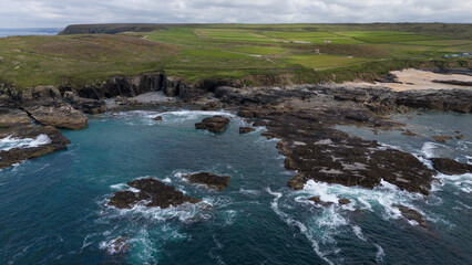 Aerial View on South Englands cliffs and Rocks near St Ives town on a cloudy spring day.