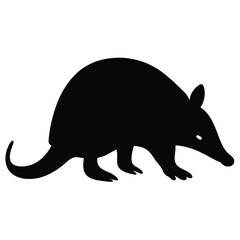Black silhouette of an armadillo walking on a white background image