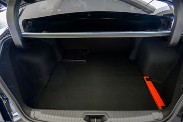 Large black empty car trunk. Open car trunk close up