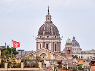 Obraz premium Photo of Vatican City, with the central dome, plaza, monuments, and sculptures. It is a city-state located within Rome, Italy, and the headquarters of the Roman Catholic Church. 