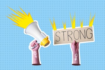 Female hands holding cardboard with word STRONG and megaphone on blue background. Feminism concept