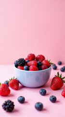 A vibrant bowl of strawberries and blueberries against a keto-friendly backdrop.