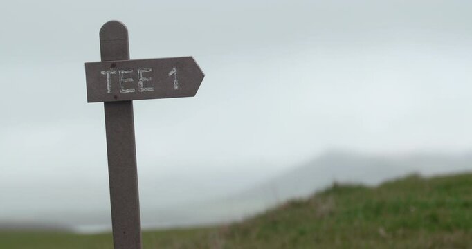 Golf course Tee one sign mist and fog