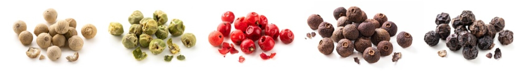 Set of various type peppercorns isolated on white background. Allspice, black, green, white, red pepper heaps collection.