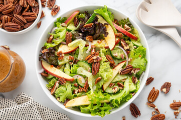 Apple Pecan Salad on a White Marble Countertop