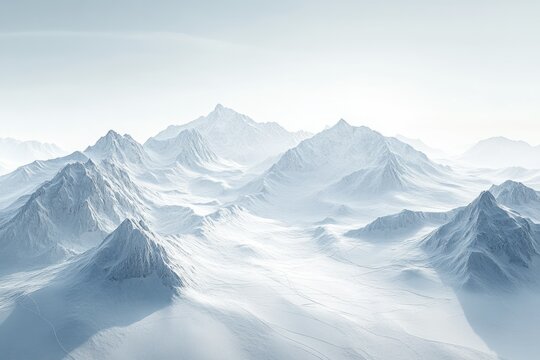 A breathtaking panoramic view of a vast, snow-covered mountain range under a bright, serene sky.