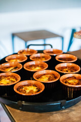 Delicious baked dishes served on a circular tray