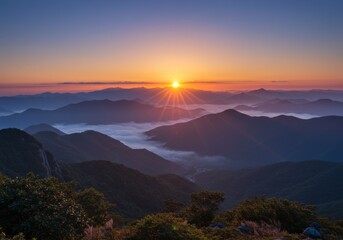 Majestic Sunrise Over Misty Mountains