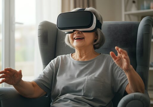 Elderly Woman Experiencing Virtual Reality VR Headset, Chair, Entertainment, Technology, Happy, Indoor.
