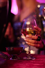 Guests with Glasses of Wine at a celebration
