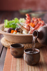 【日本酒と蟹鍋】 冬の味覚、ズワイガニの蟹鍋と愉しむ日本酒です。