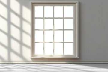 A large window with white trim and mullions casts diagonal shadows on a white wall