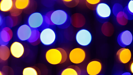 Multicolored Abstract Bokeh Lights Featuring Yellow Green Blue Red Orange Circles on Dark Festive Background