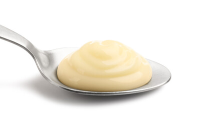 Tasty vanilla pudding in spoon isolated on white