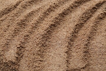 Superfood product. Flaxseed powder as background, closeup