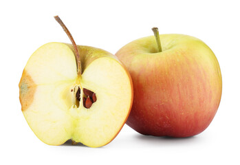 Whole and cut overripe apples isolated on white