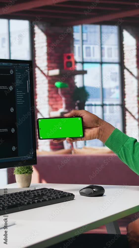 Poster vertical video young man using ai chatbot to generate real time responses next to mockup display, po