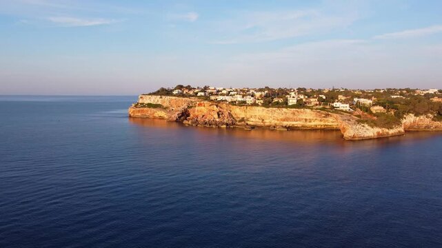 Aerial view of a village in the island of Majorca at sunset