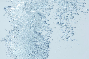 Soda water with bubbles as background, closeup