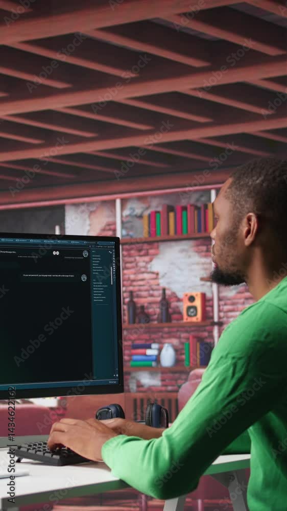 Poster vertical video african american guy at home asks questions to ai chatbot virtual assistant, typing u