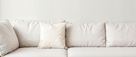 Minimalist sectional couch with aligned pillow, serene interior design
