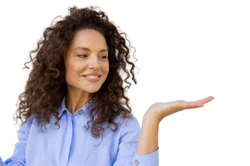 Cheerful businesswoman with curly hair showing open hand palm, offering something on transparent background
