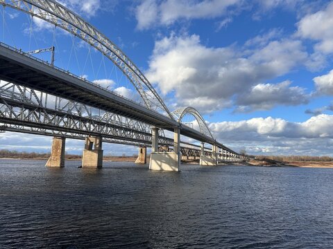 A bridge over a river with a train on it
