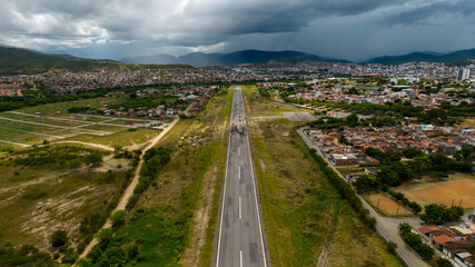 Airfield passenger terminal and stopping point for planes and helicopters with a view of the airstrip
