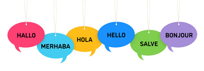 Paper speech bubbles with greetings in different languages hanging on white background. Banner design © New Africa