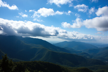 Naklejka premium view of the mountains from the top of a mountain