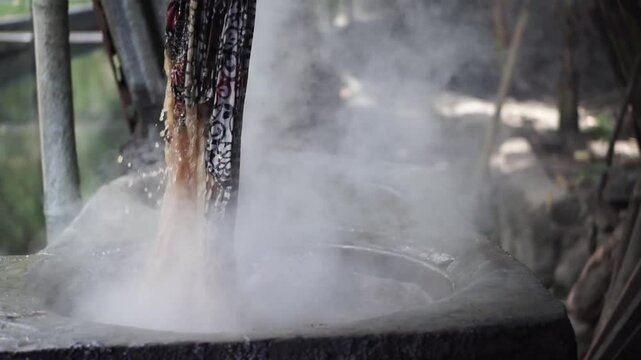 Batik Wax Removal by Boiling Traditional Fabric Finishing Process