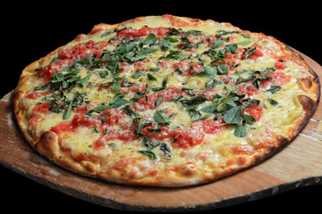 Margherita pizza with cheese, tomato sauce and basil fresh out of the oven