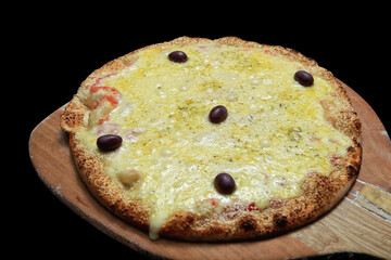 mozzarella pizza with black olives fresh out of the oven