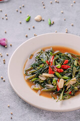 A plate of food with a sauce on it