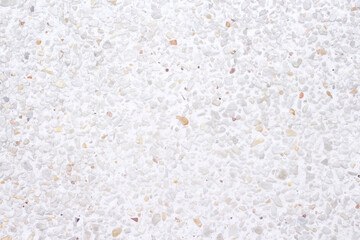Small gravel wall mix texture  brown grey white light background
